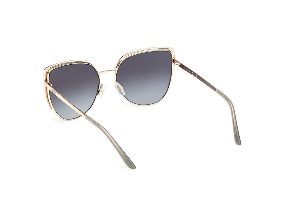 Occhiali da sole Guess GU00217 (32B) colore  oro pallido lucido forma cat eye lenti fumo grad.