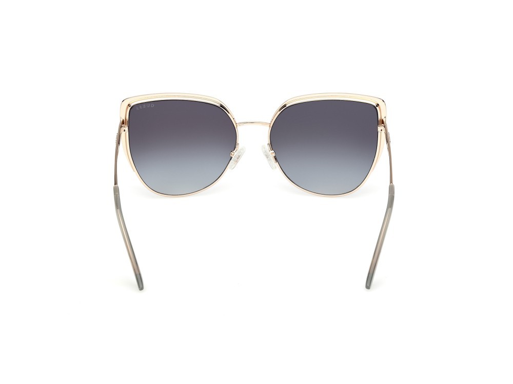 Occhiali da sole Guess GU00217 (32B) colore  oro pallido lucido forma cat eye lenti fumo grad.