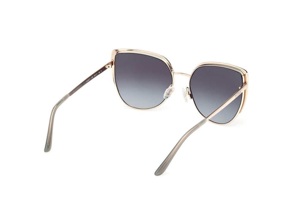Occhiali da sole Guess GU00217 (32B) colore  oro pallido lucido forma cat eye lenti fumo grad.