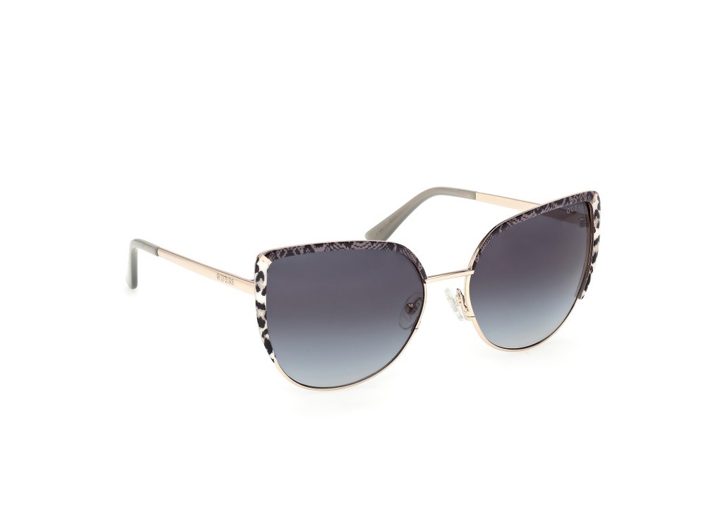Occhiali da sole Guess GU00217 (32B) colore  oro pallido lucido forma cat eye lenti fumo grad.