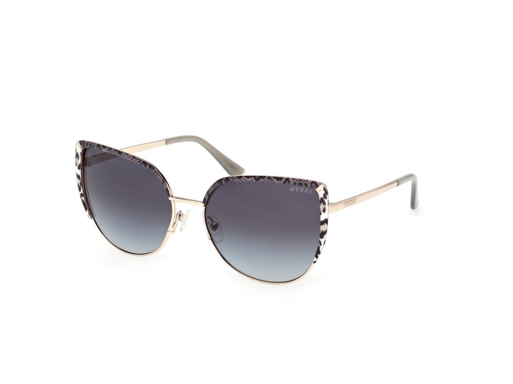 Occhiali da sole Guess GU00217 (32B) colore  oro pallido lucido forma cat eye lenti fumo grad.