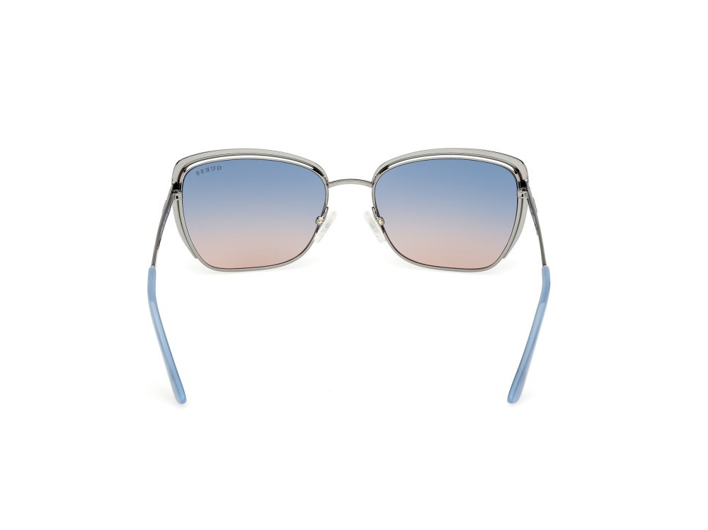 Occhiali da sole Guess GU00218 (10W) colore rutenio chiaro lucido forma quadrato lenti blu sfumato