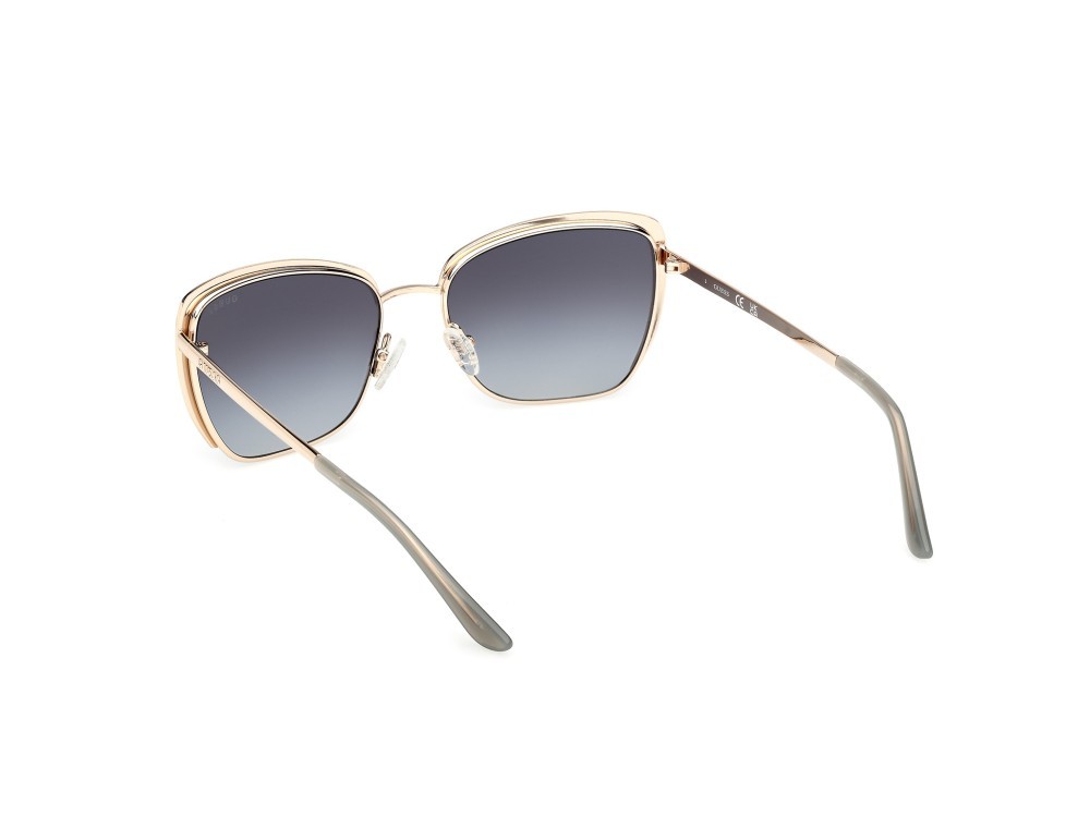 Occhiali da sole Guess GU00218 (32B) colore oro pallido lucido forma quadrato lenti fumo grad.
