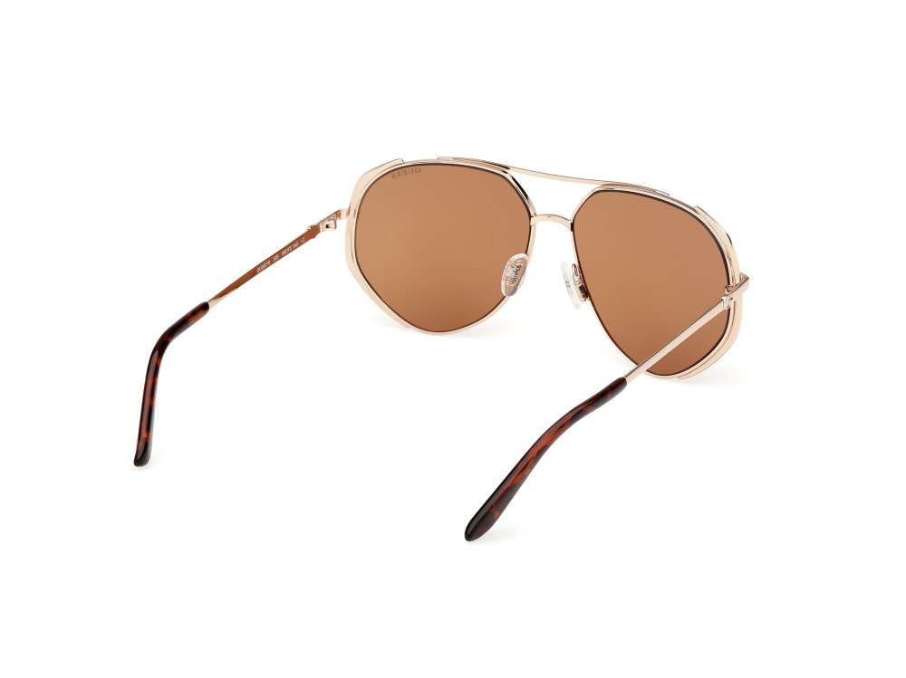 Occhiali da sole Guess GU00219 (32E) colore oro pallido opaco forma aviator lenti marrone