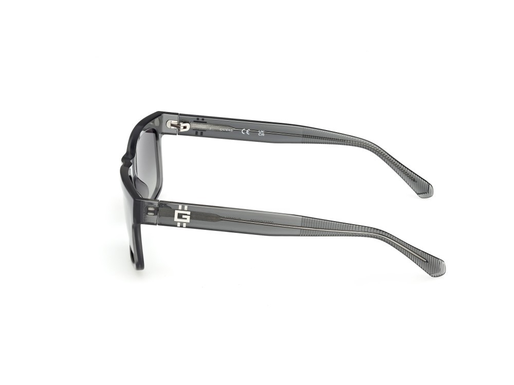 Occhiali da sole Guess GU00221 (20B) colore grigio lucido forma rettangolare lenti fumo grad.