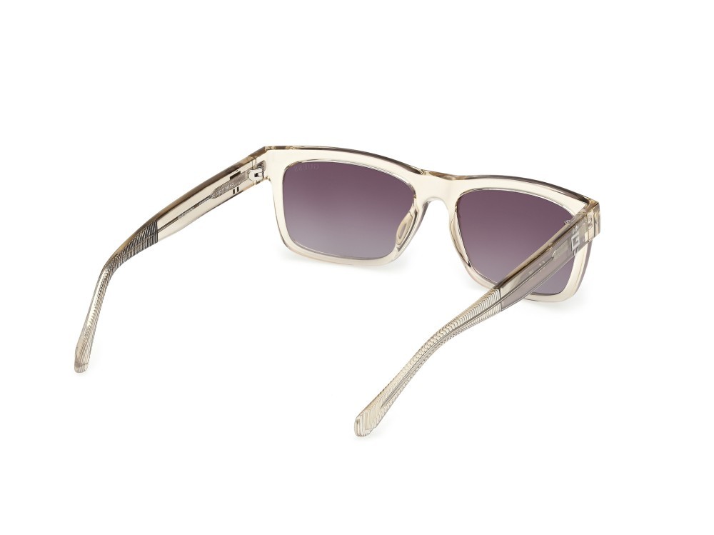 Occhiali da sole Guess GU00221 (57Z) colore beige lucido forma rettangolare lenti viola sfumato o specchiato