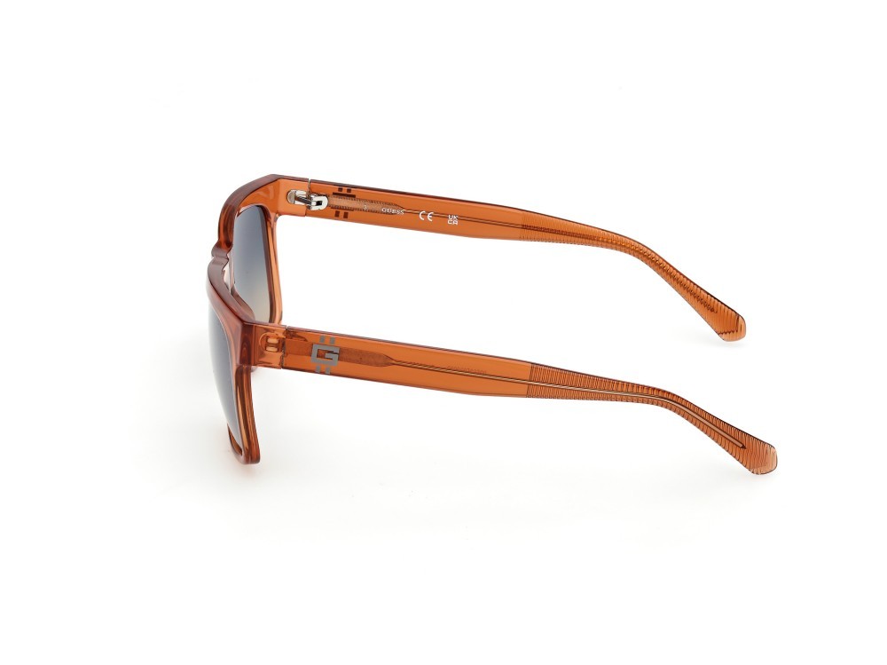Occhiali da sole Guess GU00222 (42X) colore arancio scuro lucido forma quadrato lenti blu specchiato