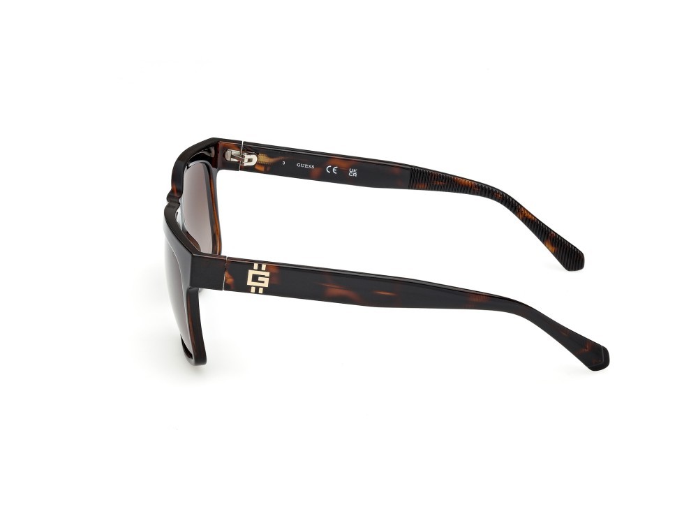 Occhiali da sole Guess GU00222 (52F) colore avana scura forma quadrato lenti marrone sfumato