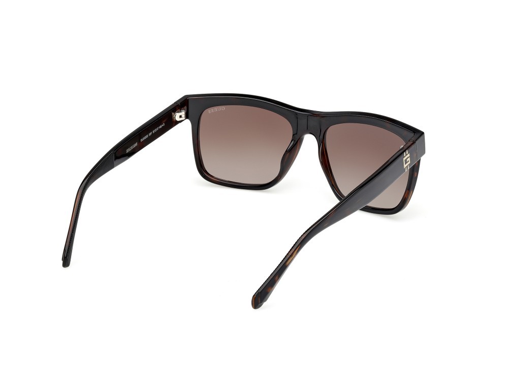 Occhiali da sole Guess GU00222 (52F) colore avana scura forma quadrato lenti marrone sfumato