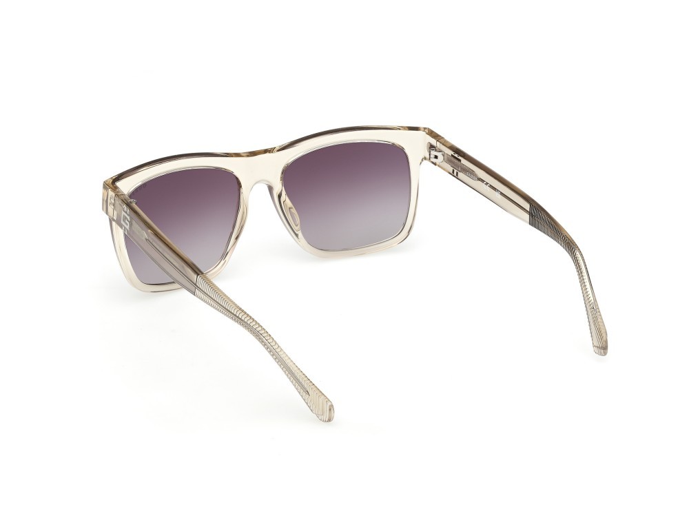 Occhiali da sole Guess GU00222 (57Z) colore beige lucido forma quadrato lenti viola sfumato o specchiato