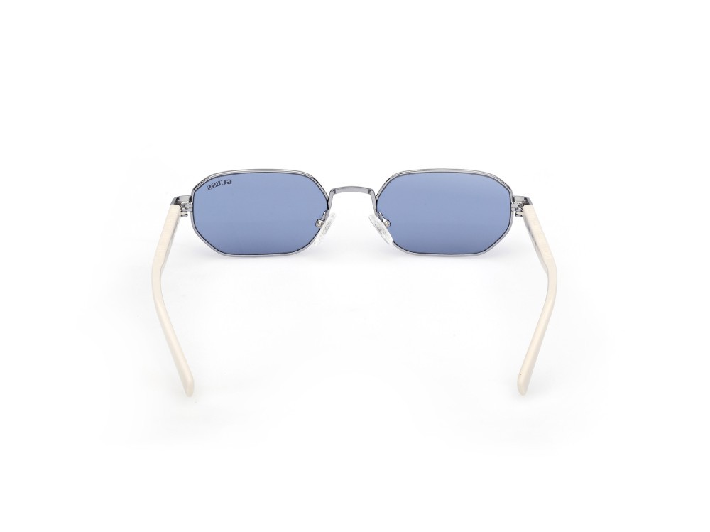 Occhiali da sole Guess GU00231 (84V) colore  azzurrro lucido - bianco lucido forma geometrico lenti blu