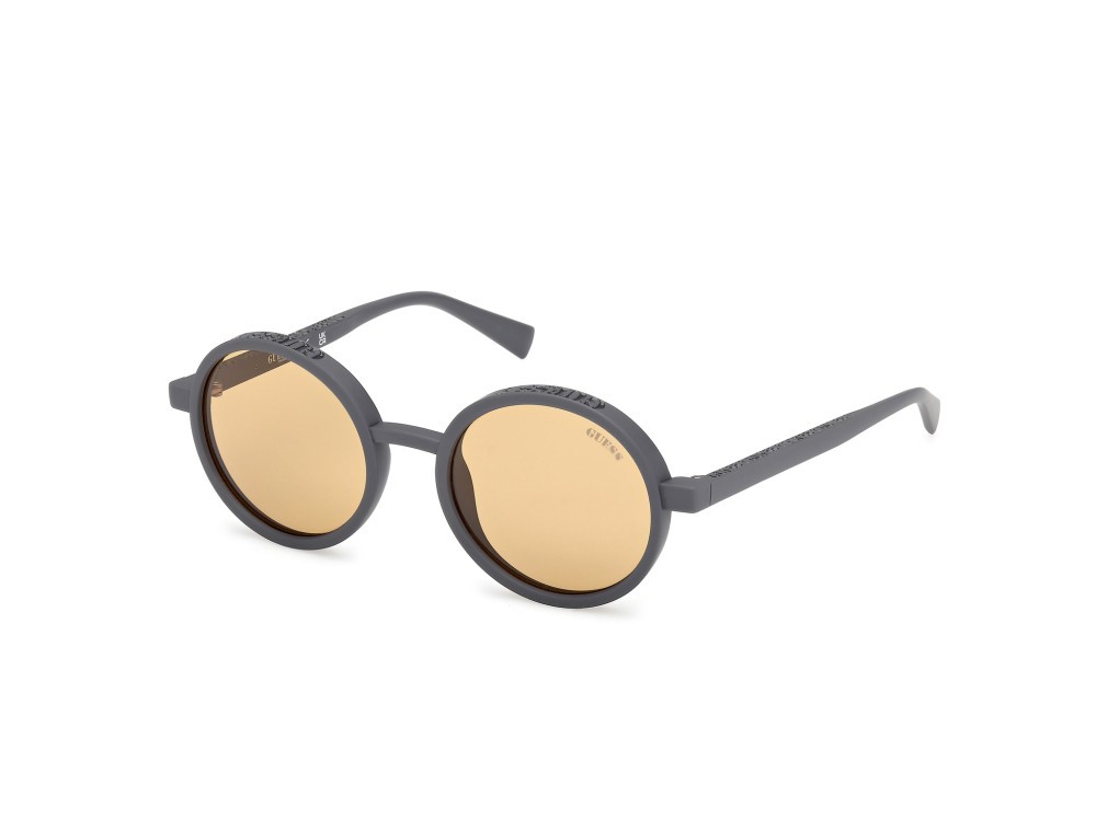 Occhiali da sole Guess GU00234 (20E) colore grigio opaco forma rotondo lenti marrone