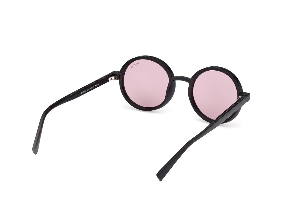 Occhiali da sole Guess GU00234 (52Y) colore avana scura forma rotondo lenti viola
