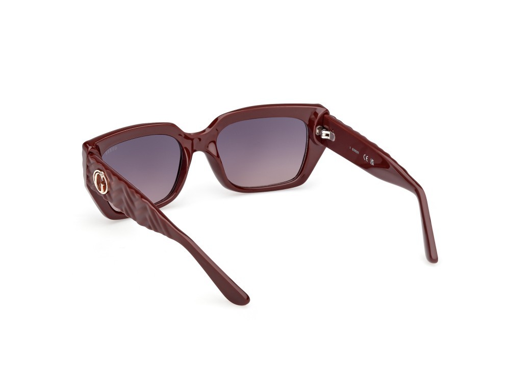 Occhiali da sole Guess GU00254 (69Z) colore bordeaux lucido / bordeaux opaco forma rettangolare lenti viola sfumato o specchiato