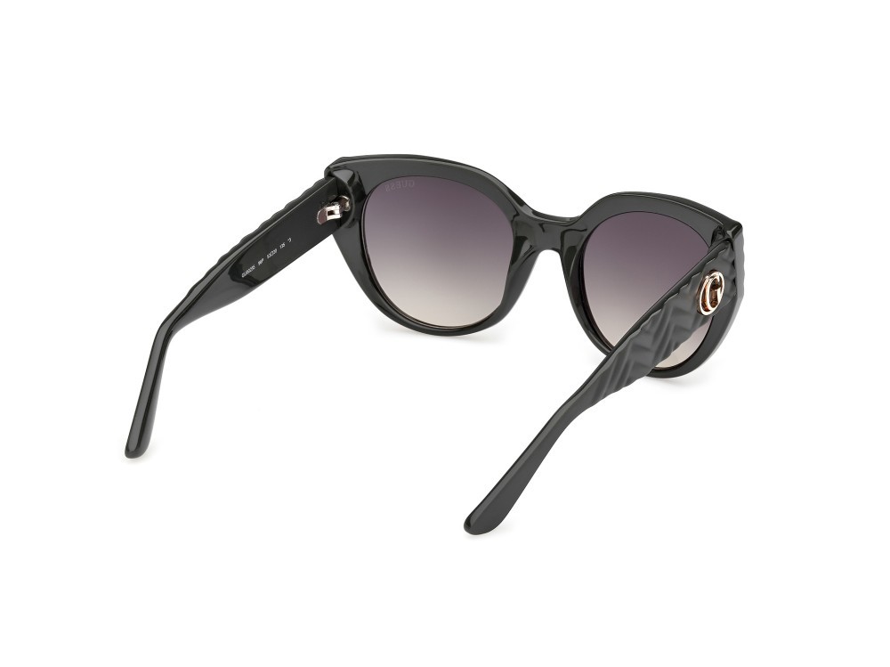 Occhiali da sole Guess GU00255 (96P) colore verde scuro lucido / verde scuro opaco forma cat eye lenti verde sfumato