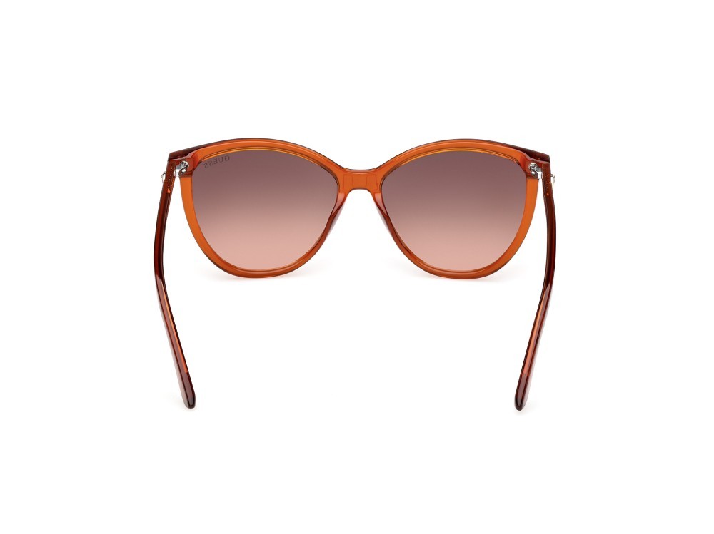 Occhiali da sole Guess GU00256 (44F) colore arancio scuro lucido forma cat eye lenti marrone sfumato