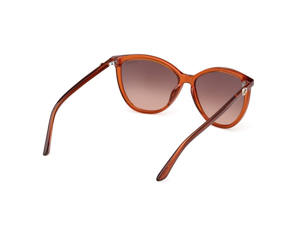 Occhiali da sole Guess GU00256 (44F) colore arancio scuro lucido forma cat eye lenti marrone sfumato