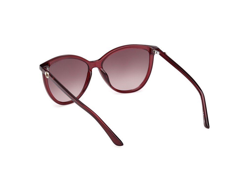 Occhiali da sole Guess GU00256 (69F) colore bordeaux lucido forma cat eye lenti marrone sfumato
