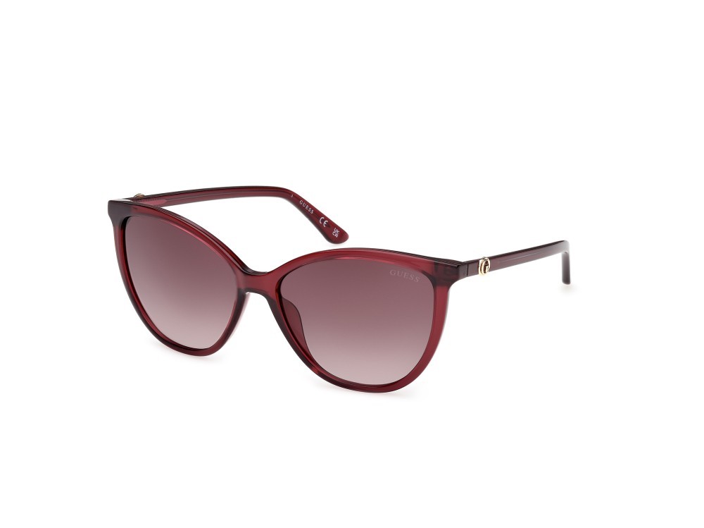Occhiali da sole Guess GU00256 (69F) colore bordeaux lucido forma cat eye lenti marrone sfumato