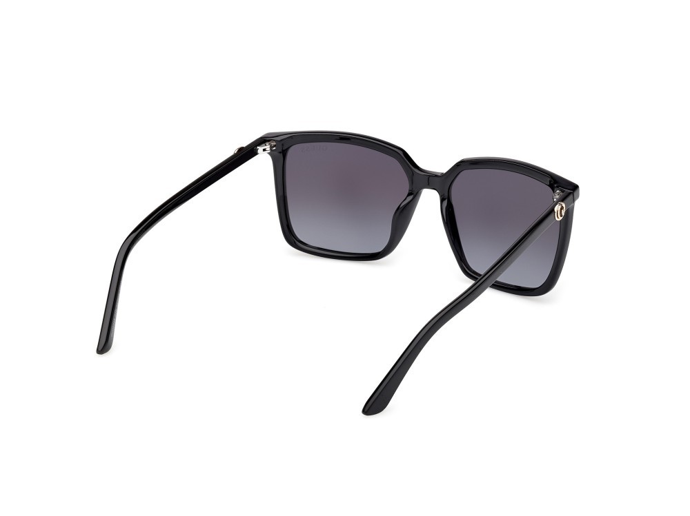Occhiali da sole Guess GU00258 (01B) colore nero lucido forma quadrato lenti fumo grad.