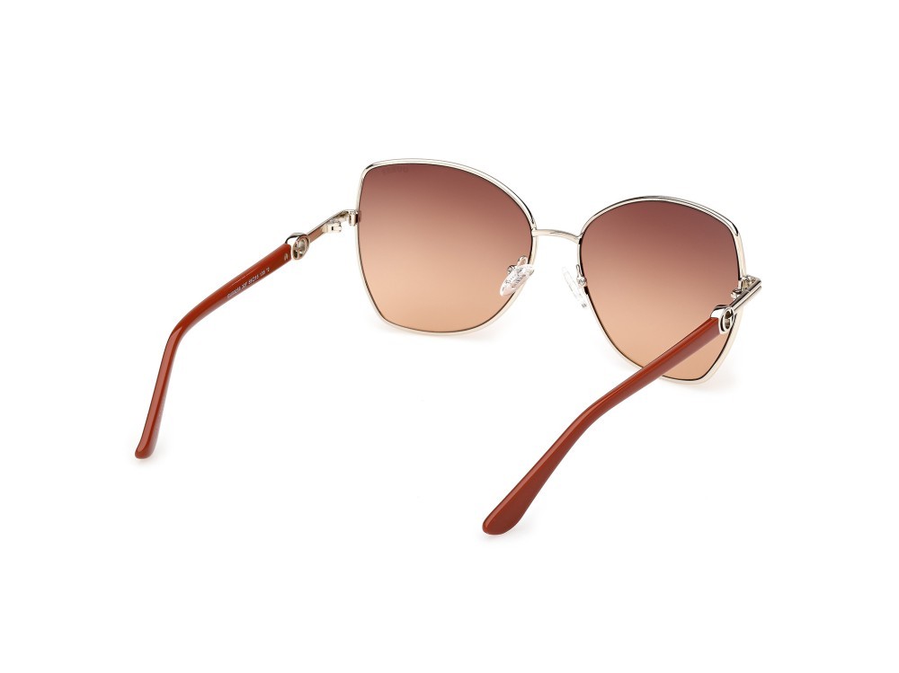 Occhiali da sole Guess GU00259 (32F) colore oro pallido lucido / arancio scuro lucido forma farfalla lenti marrone sfumato