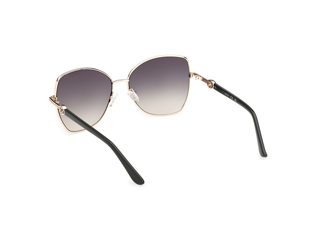 Occhiali da sole Guess GU00259 (96P) colore verde scuro lucido  forma farfalla lenti verde sfumato