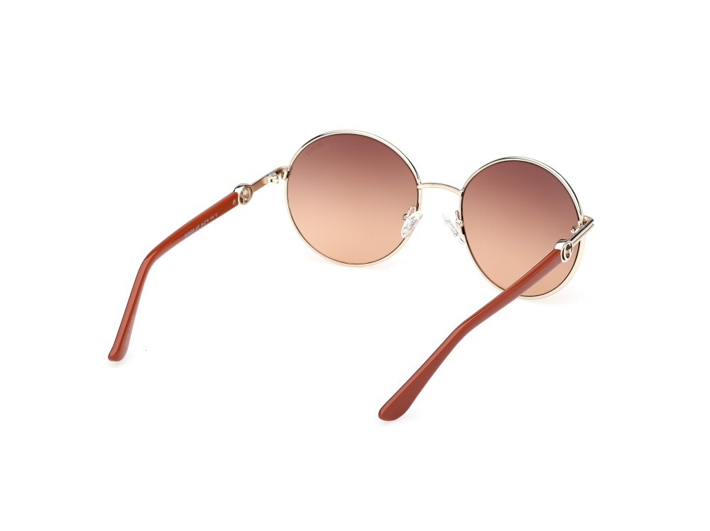 Occhiali da sole Guess GU00260 (32F) colore oro pallido lucido / arancio scuro lucido forma rotondo lenti marrone sfumato
