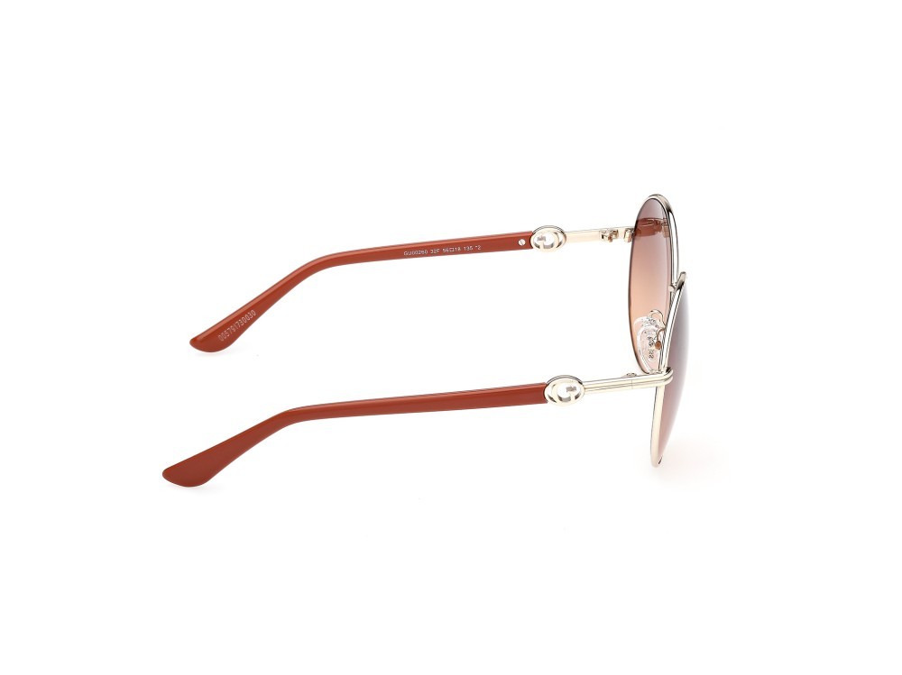 Occhiali da sole Guess GU00260 (32F) colore oro pallido lucido / arancio scuro lucido forma rotondo lenti marrone sfumato