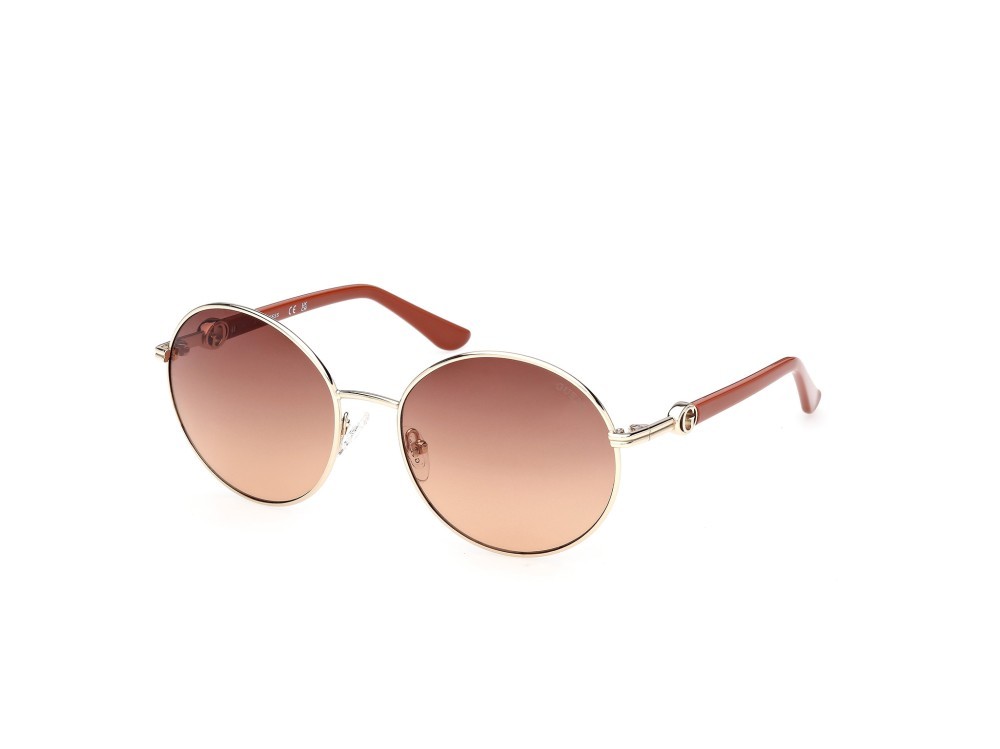 Occhiali da sole Guess GU00260 (32F) colore oro pallido lucido / arancio scuro lucido forma rotondo lenti marrone sfumato