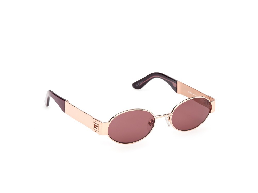 Occhiali da sole Guess GU00262 (28Y) colore oro rosé lucido forma ovale lenti viola