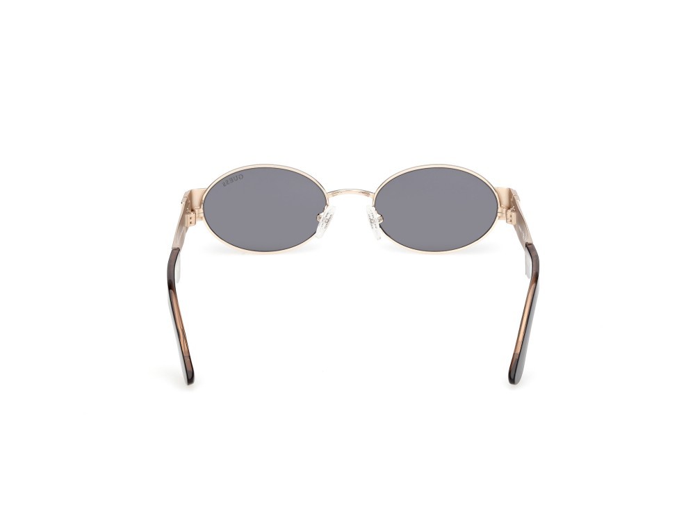 Occhiali da sole Guess GU00262 (32A) colore oro pallido lucido forma ovale lenti fumo