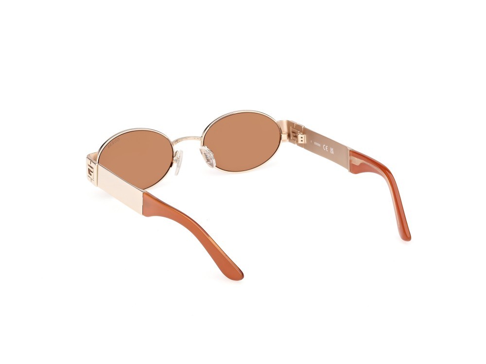 Occhiali da sole Guess GU00262 (32E) colore oro endura lucido forma ovale lenti marrone