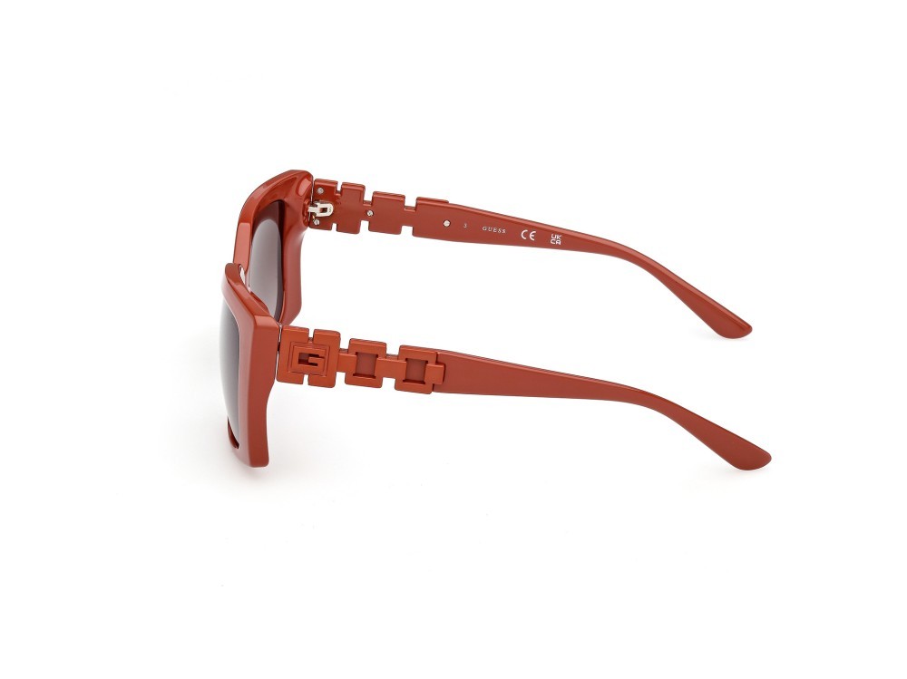 Occhiali da sole Guess GU00265-H (44F) colore arancio scuro lucido forma rettangolare lenti marrone sfumato