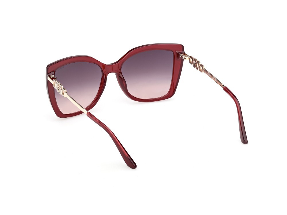 Occhiali da sole Guess GU00266 (69Z) colore bordeaux lucido / oro endura lucido forma quadrato lenti viola sfumato o specchiato