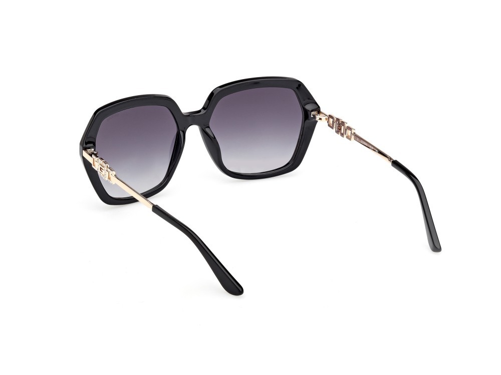 Occhiali da sole Guess GU00267 (01B) colore nero lucido / oro endura lucido forma geometrico lenti fumo grad.