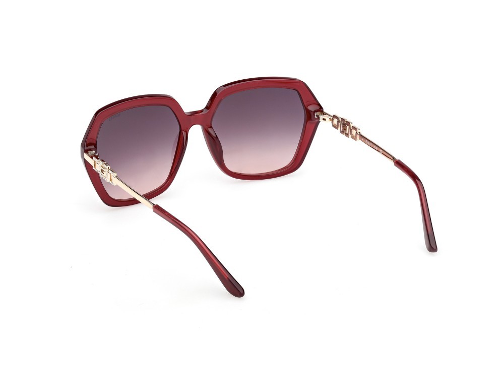 Occhiali da sole Guess GU00267 (69Z) colore bordeaux lucido / oro endura lucido forma geometrico lenti viola sfumato o specchiato