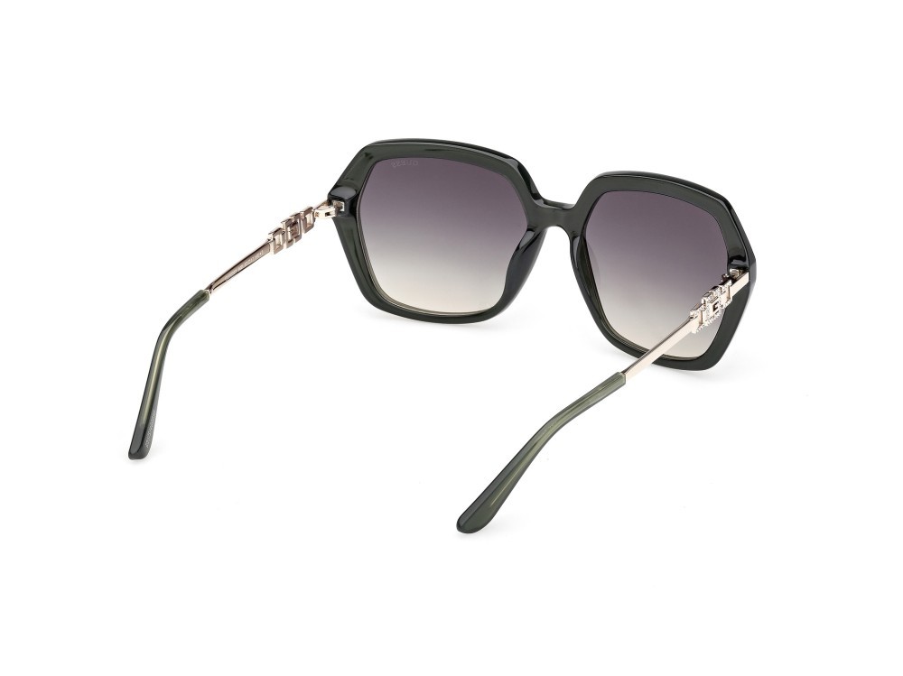 Occhiali da sole Guess GU00267 (96P) colore verde scuro lucido / oro pallido lucido forma geometrico lenti verde sfumato
