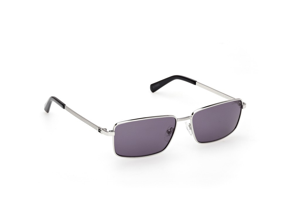 Occhiali da sole Guess GU00273 (10Y) colore rutenio chiaro lucido forma rettangolare lenti viola