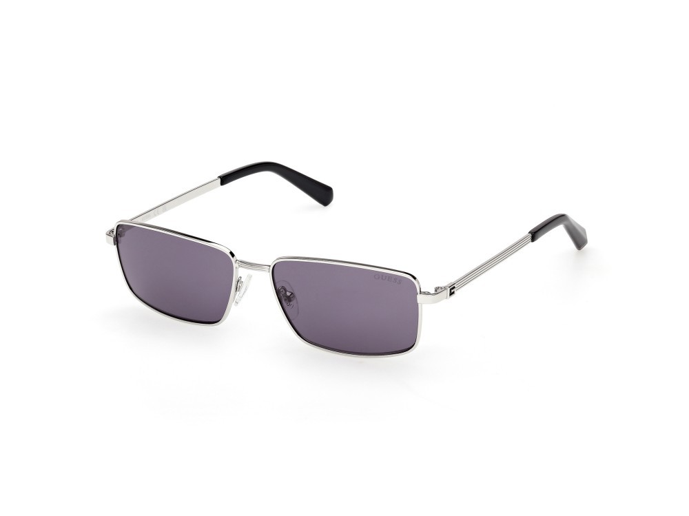 Occhiali da sole Guess GU00273 (10Y) colore rutenio chiaro lucido forma rettangolare lenti viola