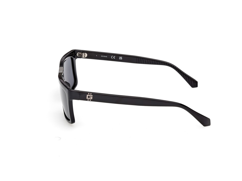 Occhiali da sole Guess GU00274 (01D) colore nero lucido forma rettangolare lenti fumo polar.