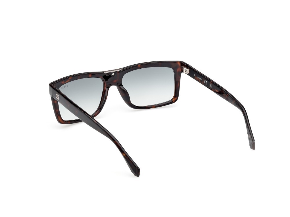 Occhiali da sole Guess GU00274 (52P) colore avana scura forma rettangolare lenti verde sfumato