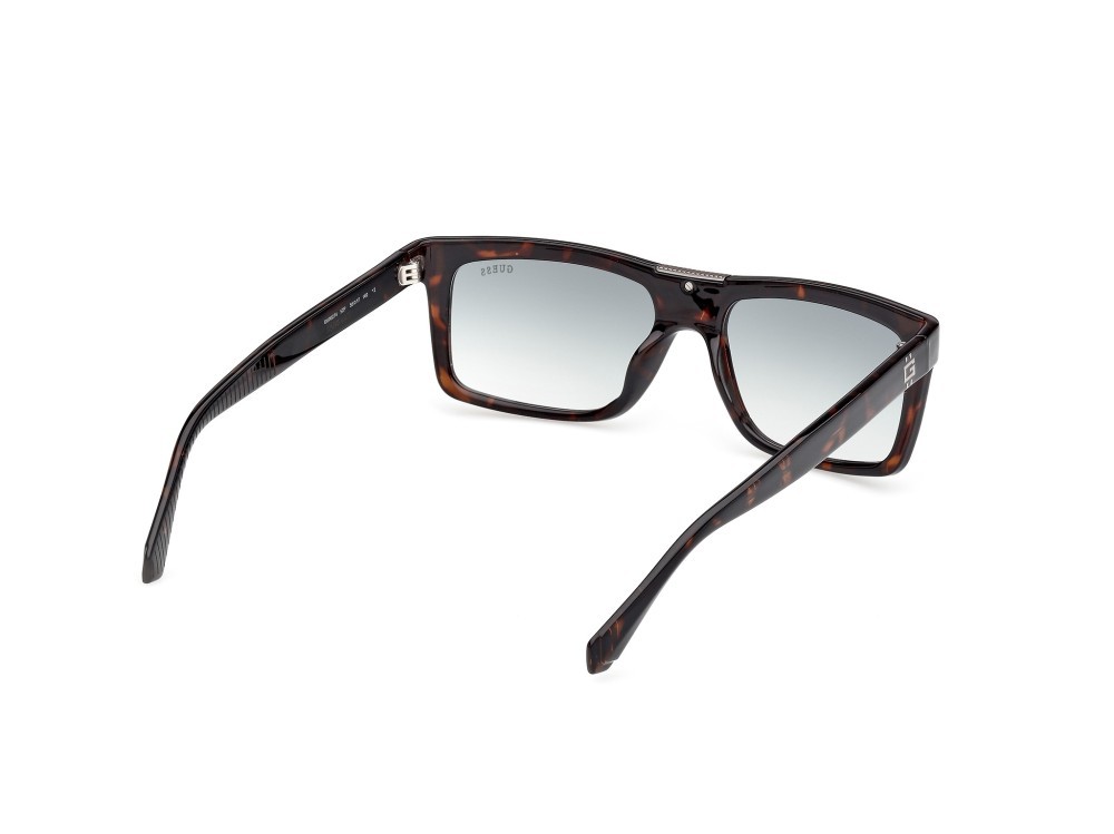 Occhiali da sole Guess GU00274 (52P) colore avana scura forma rettangolare lenti verde sfumato