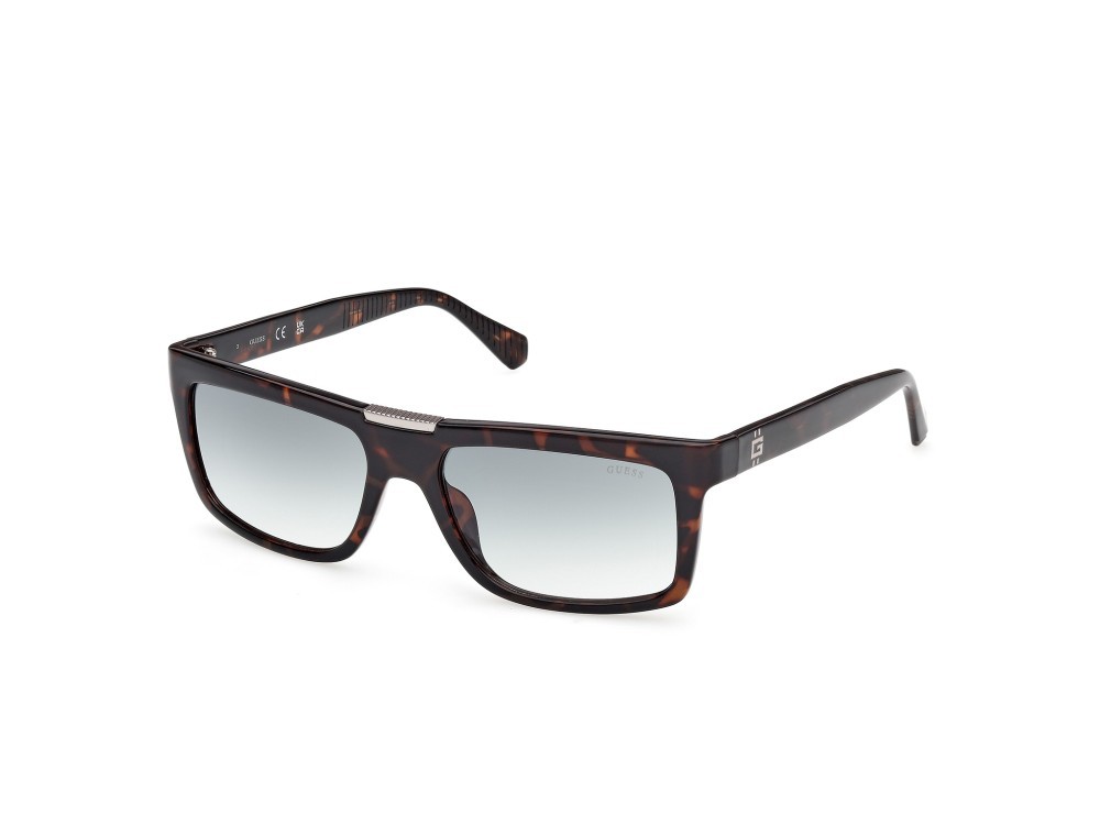 Occhiali da sole Guess GU00274 (52P) colore avana scura forma rettangolare lenti verde sfumato