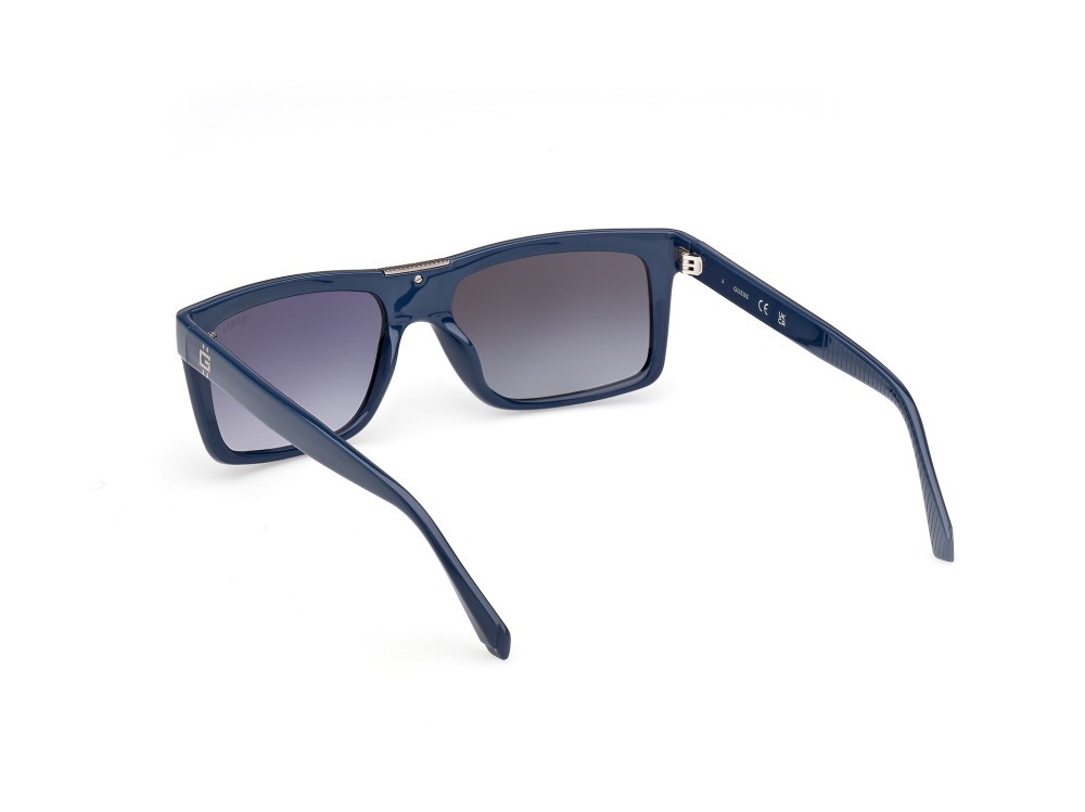 Occhiali da sole Guess GU00274 (90W) colore blu lucido forma rettangolare lenti  blu sfumato