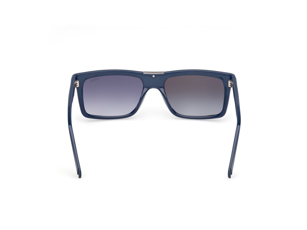 Occhiali da sole Guess GU00274 (90W) colore blu lucido forma rettangolare lenti  blu sfumato