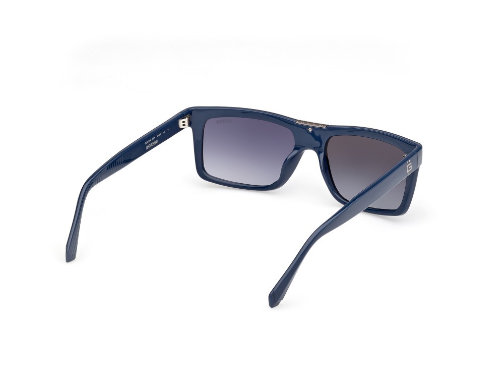Occhiali da sole Guess GU00274 (90W) colore blu lucido forma rettangolare lenti  blu sfumato