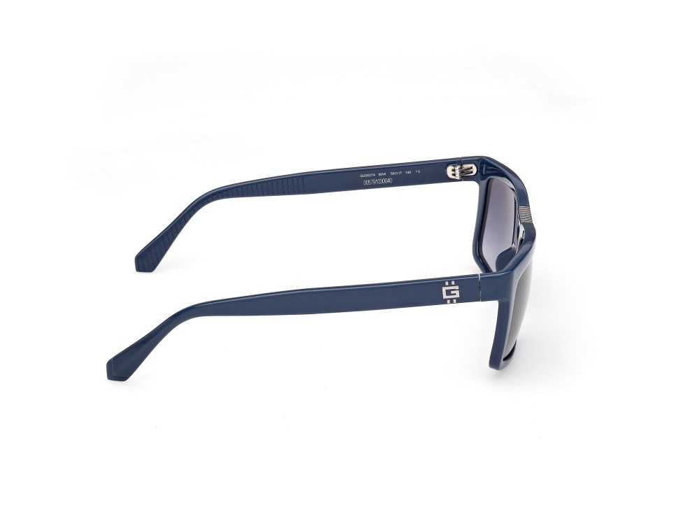 Occhiali da sole Guess GU00274 (90W) colore blu lucido forma rettangolare lenti  blu sfumato