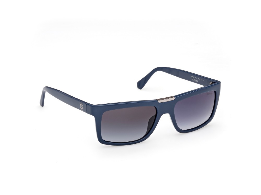Occhiali da sole Guess GU00274 (90W) colore blu lucido forma rettangolare lenti  blu sfumato