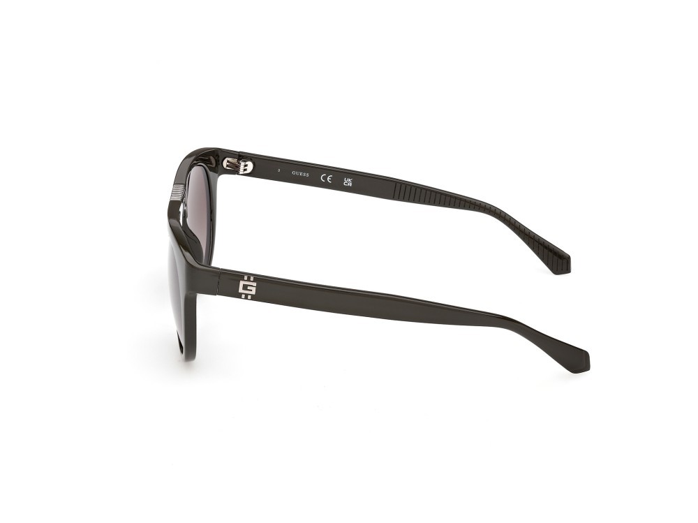 Occhiali da sole Guess GU00275 (96F) colore verde scuro lucido forma rotondo lenti marrone sfumato