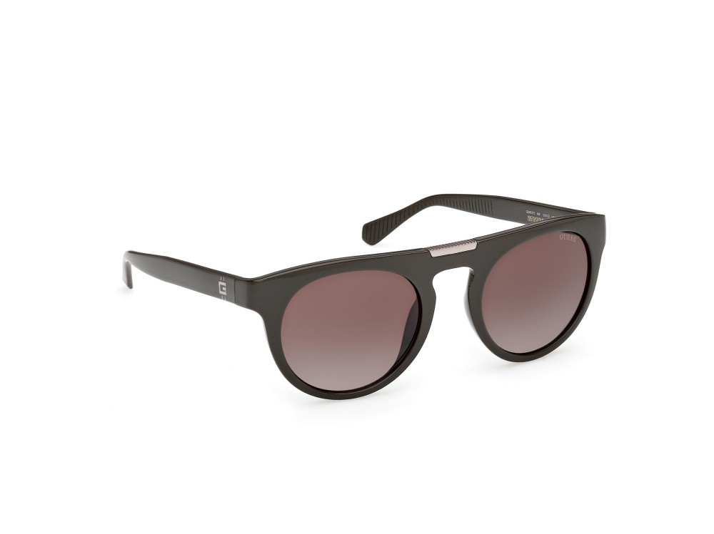 Occhiali da sole Guess GU00275 (96F) colore verde scuro lucido forma rotondo lenti marrone sfumato